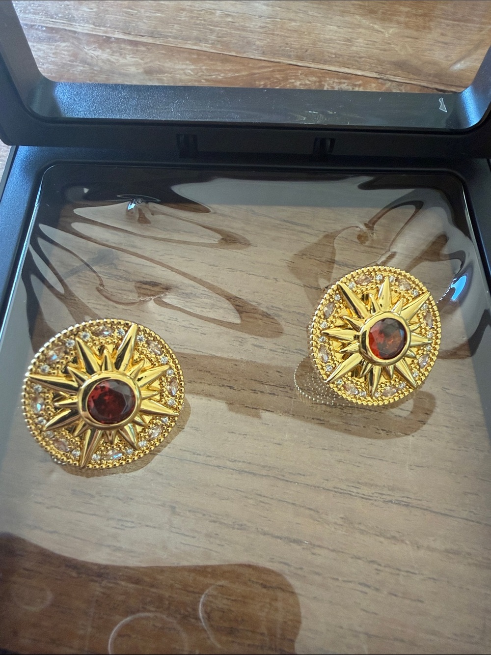 Gold Sunburst Brooch with Red Center Gem
